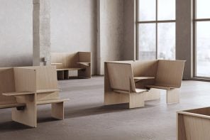 最小的木制cubicle-like家具系统创建舒适+舒适的角落在现代办公空间中